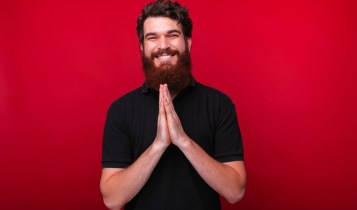 man with prayer hands