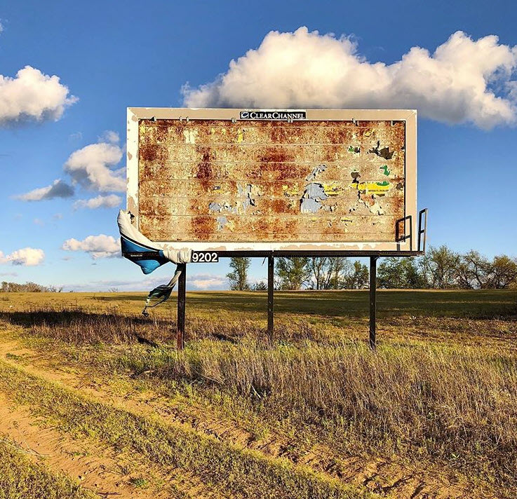 photo of rusted billboard panel 
