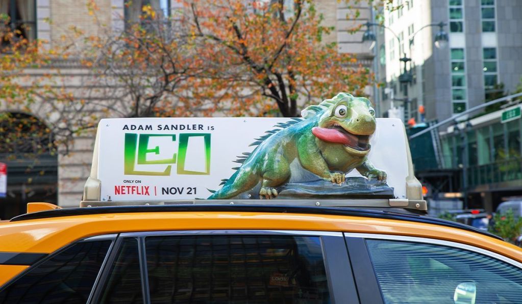 Leo 3D lizard on taxi top advertising 