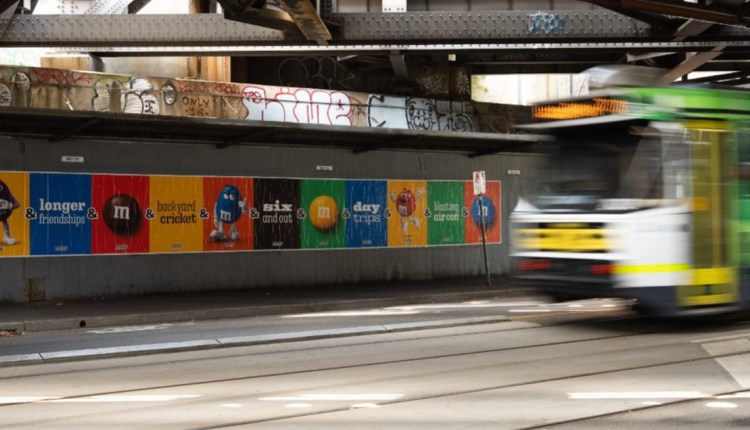 M&M debuts longest street poster