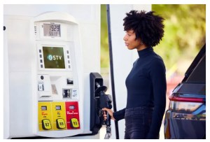 GSTV woman at pump